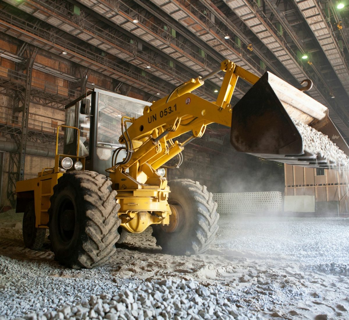 Excavator at work. Heavy machinery on construction site.